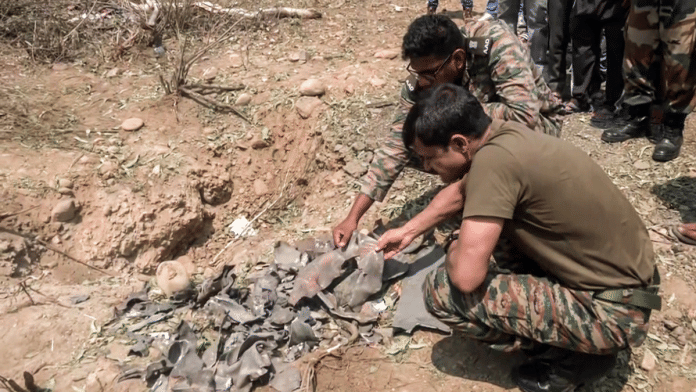 Representational image. | Armed forces personnel examine debris a projectile after it was shot down. | ANI file