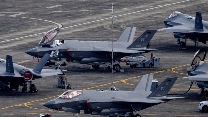 US Air Force F-35 Lightning II fighter jets parked on the tarmac. | Reuters