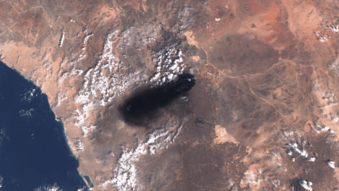 A satellite image shows black smoke rising from an area of Saudi Arabia’s East-West oil pipeline south of Medina, Hejaz Region, Saudi Arabia | European Union/Copernicus Sentinel-3/Handout via Reuters