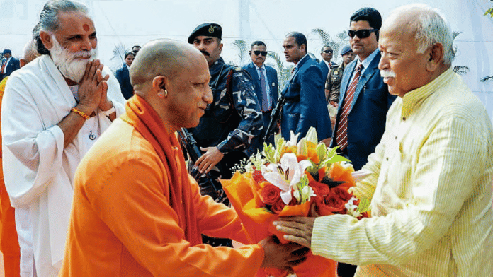 File photo of Uttar Pradesh Chief Minister Yogi Adityanath greeting Rashtriya Swayamsevak Sangh chief Mohan Bhagwat at a programme in Lucknow | X/@myogiadityanath