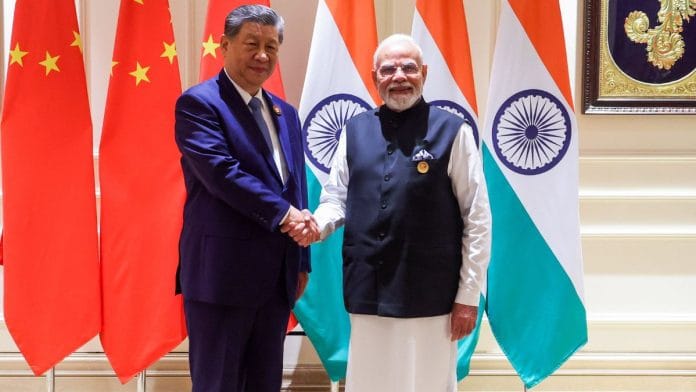 Prime Minister Narendra Modi and Chinese President Xi Jinping exchange a handshake during a bilateral meeting at the 18th BRICS Summit, in New Delhi on Saturday.