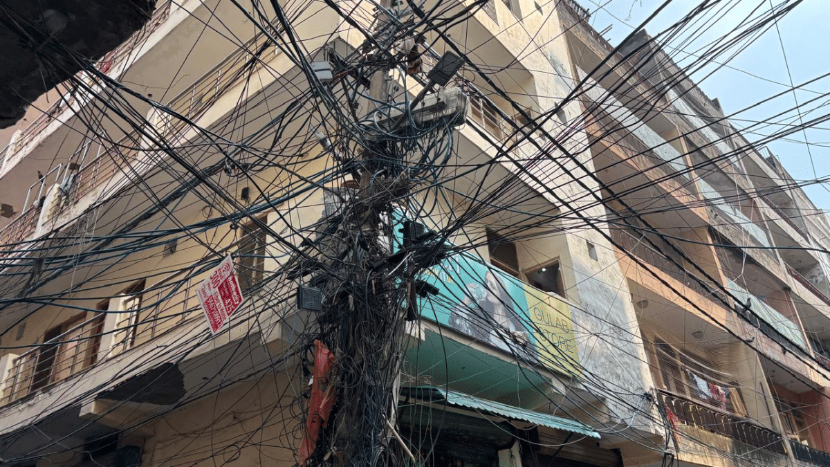 Dangling wires across buildings in North Campus’ Gurmandi area that is home to DU students | Samridhi Tewari | ThePrint
