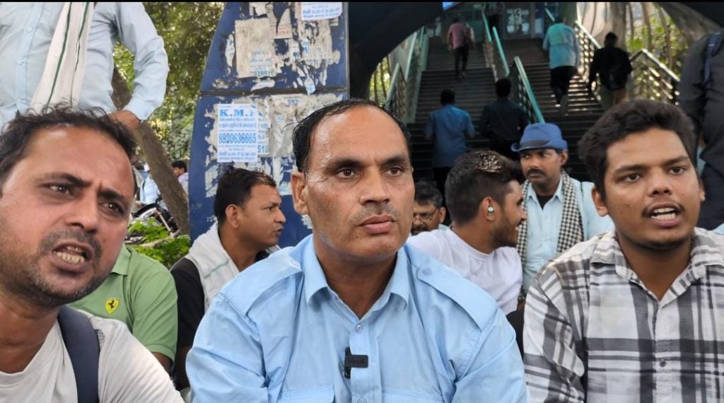 Chandra Hashmi sits with other striking drivers outside the depot | Himanshi Aggarwal, ThePrint