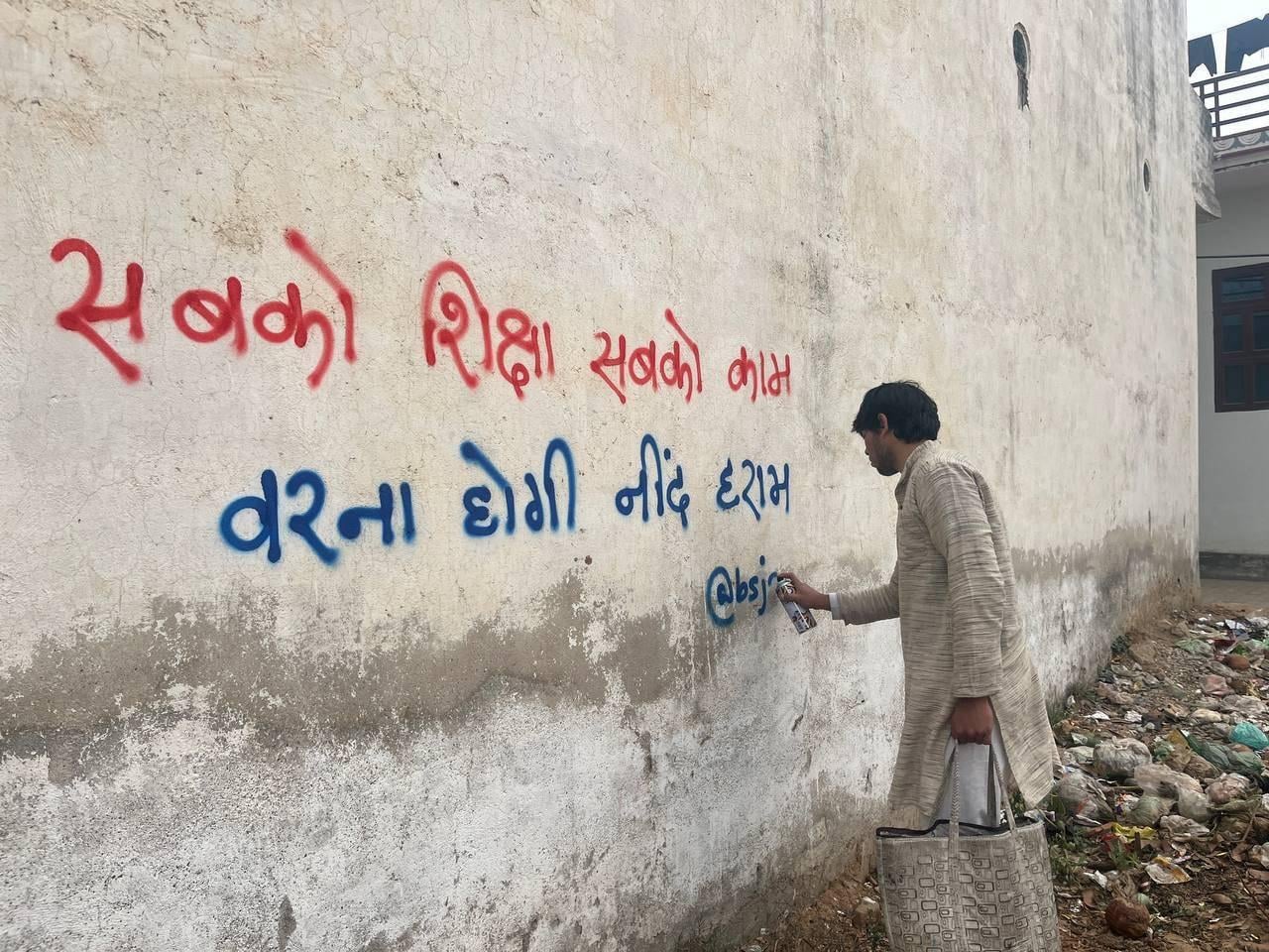 Himanshu Thakur writes a protest slogan. | Special arrangement 