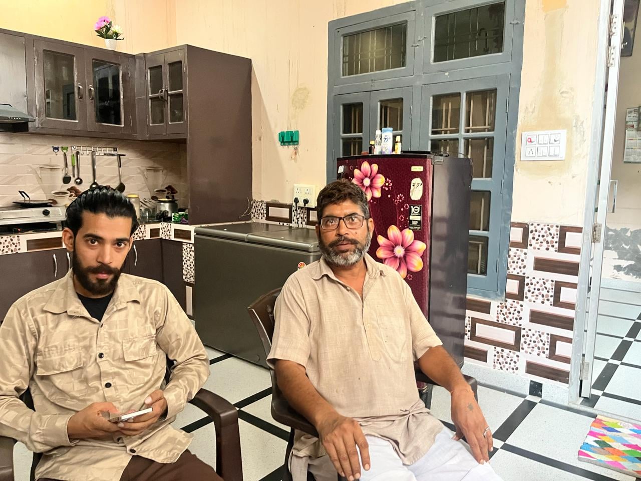 Shravan’s father and brother discuss the village panchayat’s unofficial boycott of their son and daughter-in-law | Saqiba Khan/ThePrint
