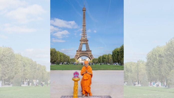 Swami Keshavvandas, the sixth and current spiritual guru of the BAPS Swaminarayan Sanstha, at the Eiffel Tower on Saturday | Photo: @BritIndianVoice/X