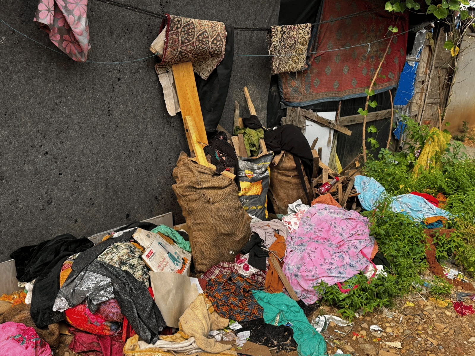 Clothes and other belongings left behind at a Rohingya settlement in Jammu after families moved out. | Photo: Sagrika Kissu | ThePrint
