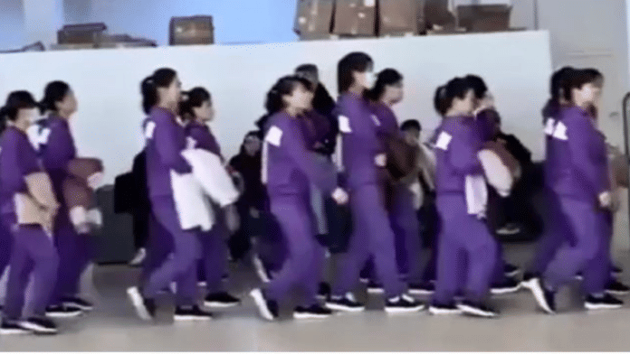 Image of suspected North Korean labourers in a Wildberries warehouse in Moscow | Credit: MSMT report