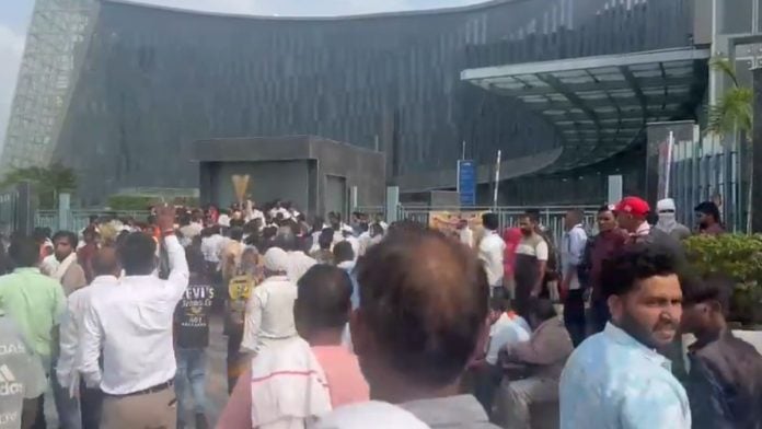 Sanitation workers protesters outside Noida Development Authority | X