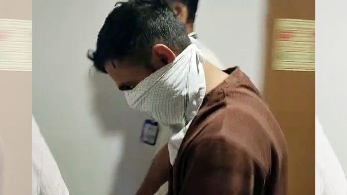 File photo: Dhananjay Lokhande, accused in the NEET-UG 2026 paper leak case, being taken from the Rouse Avenue Court in Delhi in May | ANI Video Grab