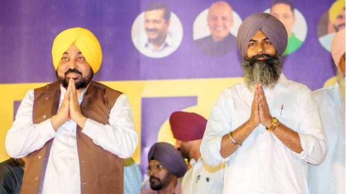 Punjab Chief Minister and AAP leader Bhagwant Mann with Gurpreet Singh Sekhon during his induction ceremony in Zira Sunday | X: @BhagwantMann