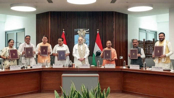 Union Home Minister Amit Shah, along with (L-R) Delhi CM Rekha Gupta, Rajasthan CM Bhajanlal Sharma, Uttarakhand CM Pushkar Dhami, Union Jal Shakti Minister CR Paatil, Uttar Pradesh CM Yogi Adityanath, Himachal Pradesh CM Sukhvinder Singh Sukhu and Haryana CM Nayab Singh Saini, during the signing of MoU for Kishau Multi-Purpose Project, in New Delhi Tuesday | ANI Video Grab