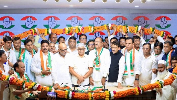 Amir Alam Khan and several new Congress joinees at the press briefing Wednesday | Facebook