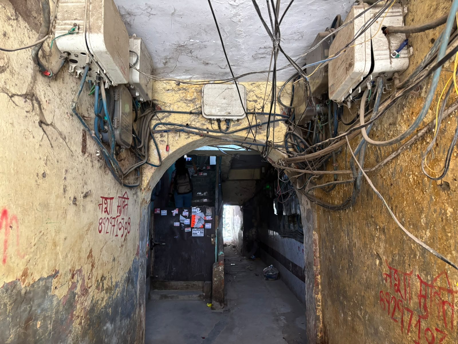 A rented accommodation in Vijay Nagar, with electrical wires dangling over the entrance. The house has no fire safety entry-exit | Samridhi Tewari | ThePrint