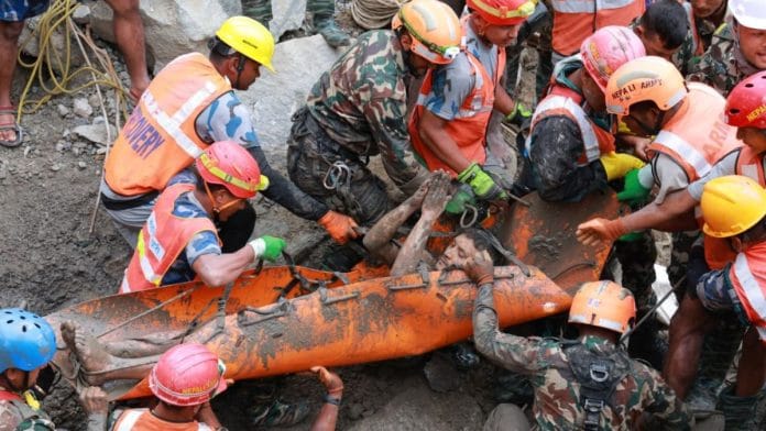 Kabir Mahajan, a mechanical supervisor of Upper Trishuli 3A hydropower project, receives medical care after he was rescued | By special arrangement