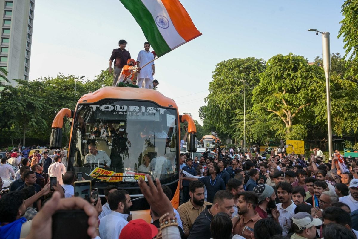 Congress MPs stand on top of a bus while en route to Jantar Mantar for a sit-in protest | Suraj Singh Bisht | ThePrint