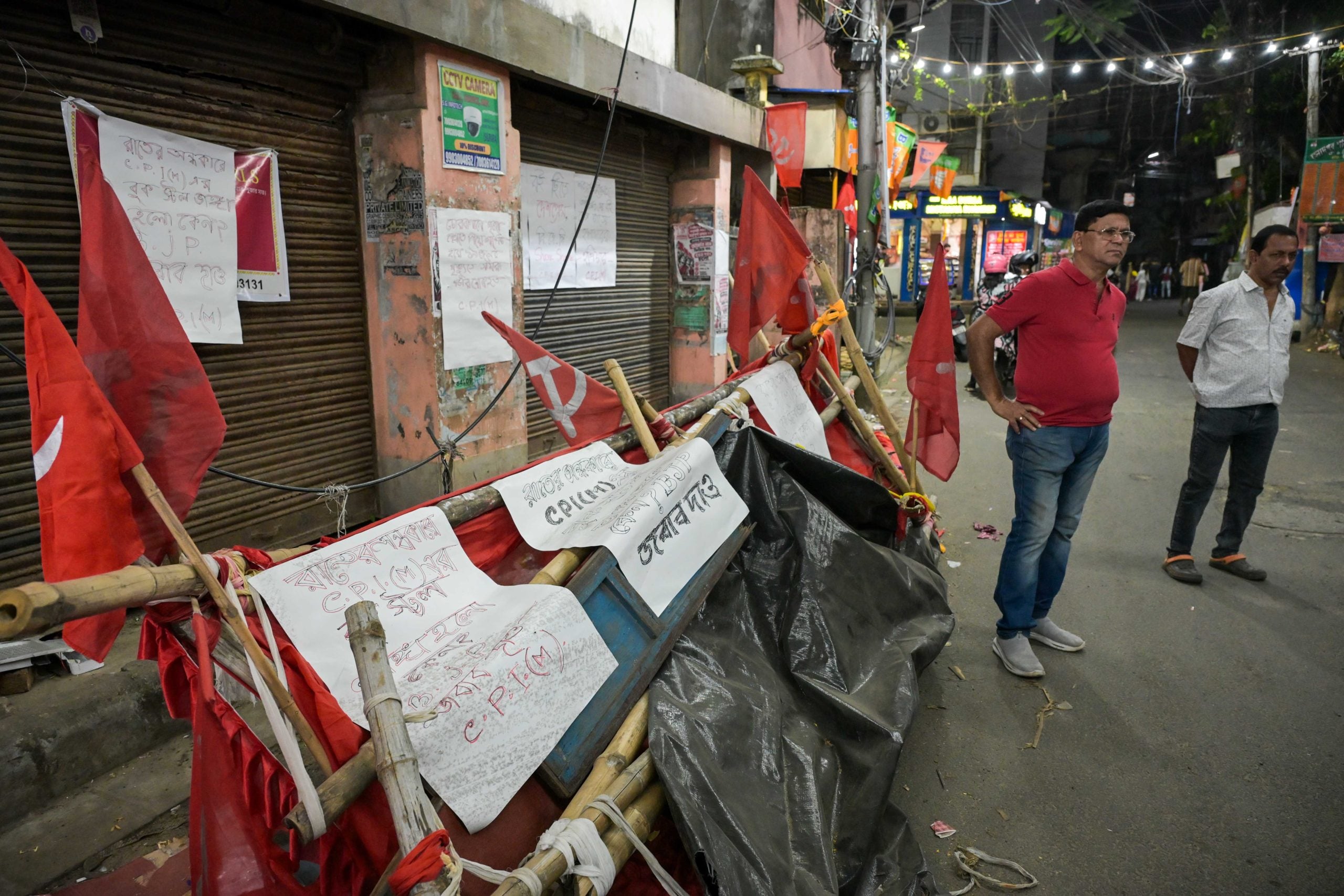 Hand-written posters put up on a vandalised Left bookstall in Kolkata. Left workers have blamed BJP for such attacks across Kolkata and West Bengal during Durga Puja | Suraj Singh Bisht | ThePrint