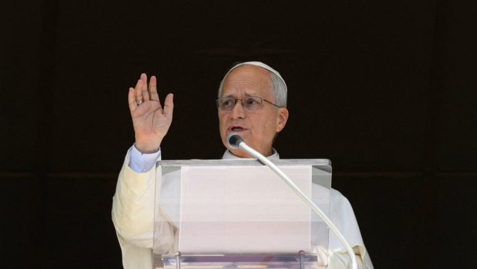 Pope Leo leads the Angelus prayer from the window of the Apostolic Palace at the Vatican, October 11, 2026. | Reuters