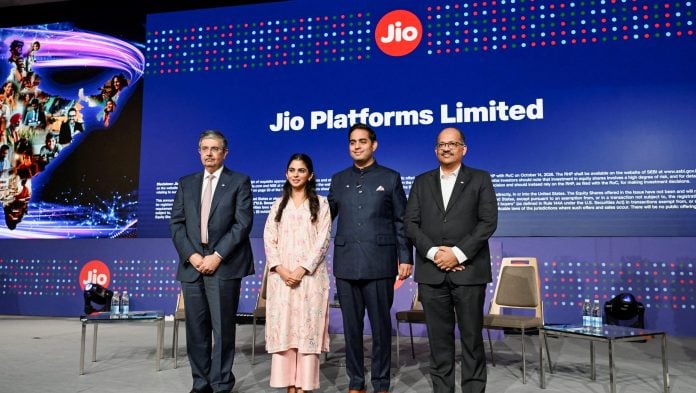 Uday Kotak, founder and non-executive director of Kotak Mahindra Bank; Isha Ambani, non-executive director of Jio Platforms Ltd.; Akash Ambani, chairman of Reliance Jio Infocomm Ltd. and director of Reliance Retail Ventures Ltd.; and Pankaj Pawar, chief executive officer of Jio Platforms Ltd., pose for a picture during a Jio Platforms Ltd. IPO press conference in Mumbai, India.| Ashish Vaishnav/Reuters