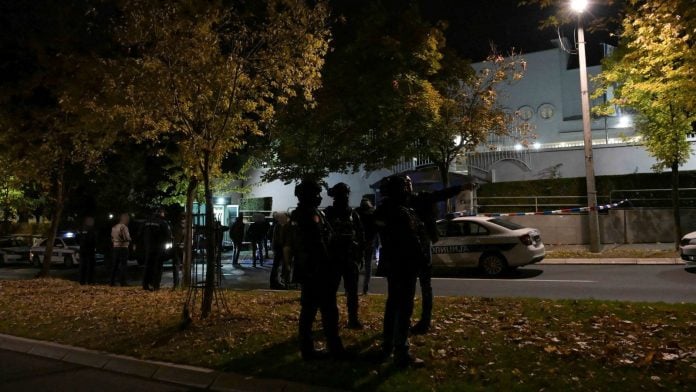 Police officers secure the area, after an attack in front of Israel’s embassy in Belgrade, Serbia | REUTERS