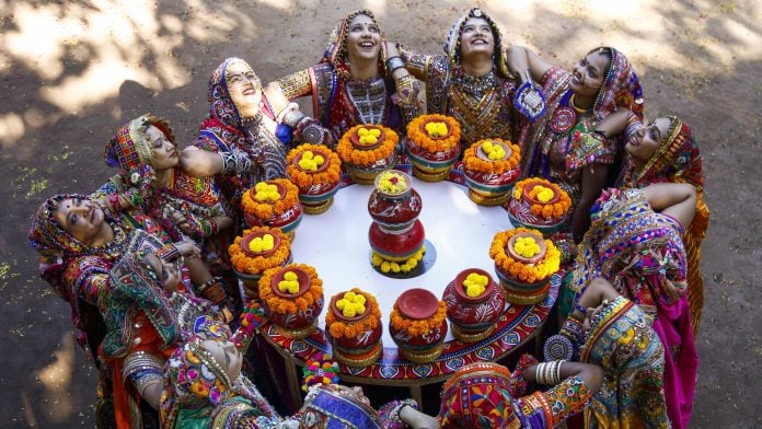 Representational Image | Artists of the Panghat Performing Arts group form a circle around the 'Garba' pots during the 'Garba' full-dress rehearsal ahead of the Navaratri festival, in Ahmedabad on Sunday. (ANI Photo)