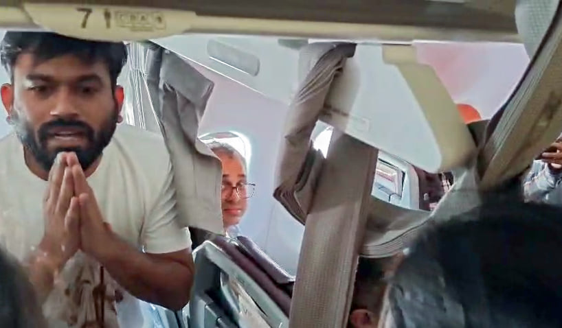 CJP Founder Abhijeet Dipke detained by the Police after his flight landed at IGI Airport in New Delhi Saturday | ANI Video Grab