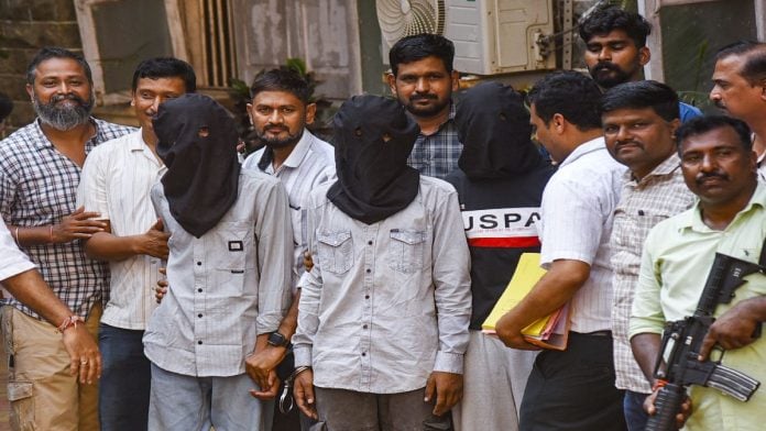 Mumbai Police with three of the accused in the Tiger Shroff shooting case at the city's Esplanade Court, where the latter were Wednesday remanded in police custody until 31 October | ANI