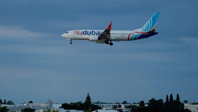 A plane carrying passengers from an earlier Flydubai flight that was diverted to Saudi Arabia arrives at Ben Gurion Airport in Tzafria, Israel on Sept. 30. Photographer: Erik Marmor/Getty Images | Bloomberg