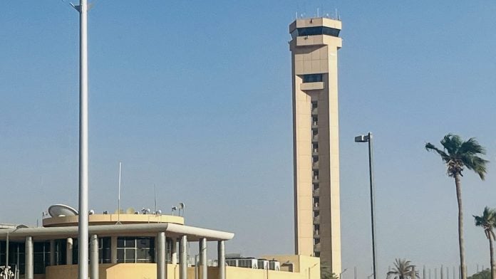 An air traffic control tower at King Khalid International Airport in Riyadh. Photographer: AFP/Getty Images/ Bloomberg