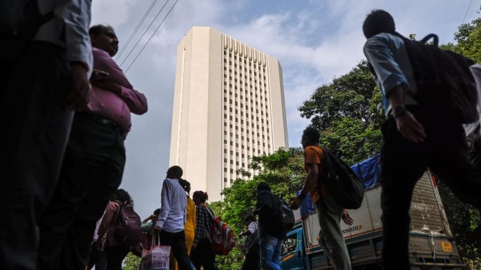 The Reserve Bank of India (RBI) headquarters, center, in Mumbai, India, on Friday, Aug. 7, 2026. Indias central bank is emerging as one of Asia's monetary policy holdouts, confident the latest oil shock wont derail economic growth or fuel the kind of persistent inflation that would warrant higher interest rates. | Bloomberg