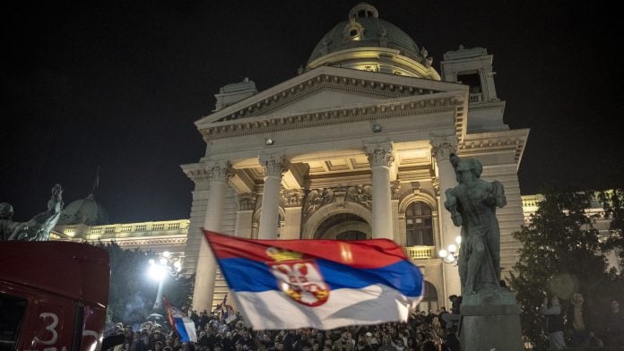 People celebrate in front of the National Assembly in downtown Belgrade after Aleksandar Vucic conceded the elections in Belgrade Andrej Ivanov/Getty Images Europe | Bloomberg