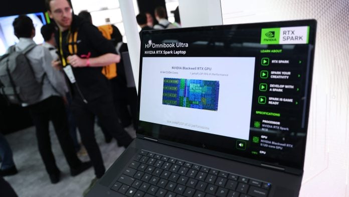 A laptop computer powered by the NVIDIA RTX Spark chip stands on display at the NVIDIA Berlin GPU Technology Conference (GTC) on October 21, 2026 in Berlin, Germany. The three-day event is bringing together developers, researchers, and industry leaders in artificial intelligence infrastructure. (Photo by Sean Gallup/Getty Images)