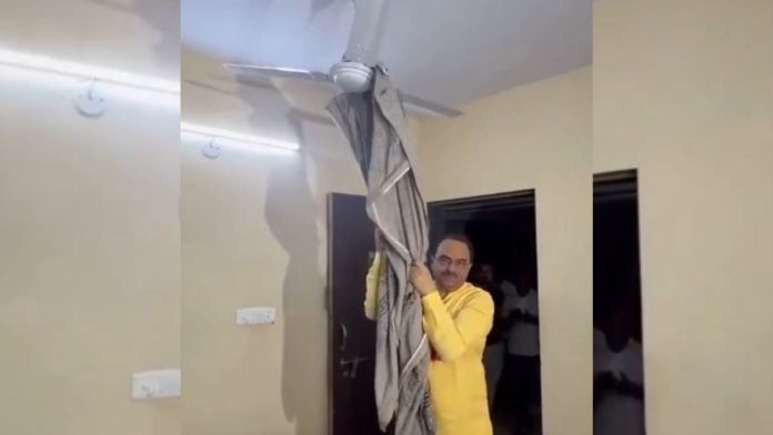 Vice Chancellor of Veer Narmad South Gujarat University demonstrates how the anti-suicide fan works | X