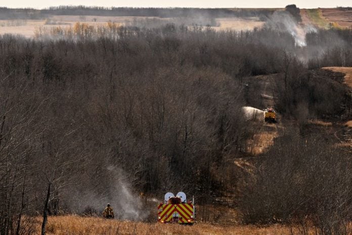 Four killed after high winds turn grass fire deadly at Canadian military base, report says