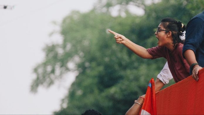 AISA leader Neha Bora at the protest march in Delhi on Monday | Photo: Manisha Mondal | ThePrint