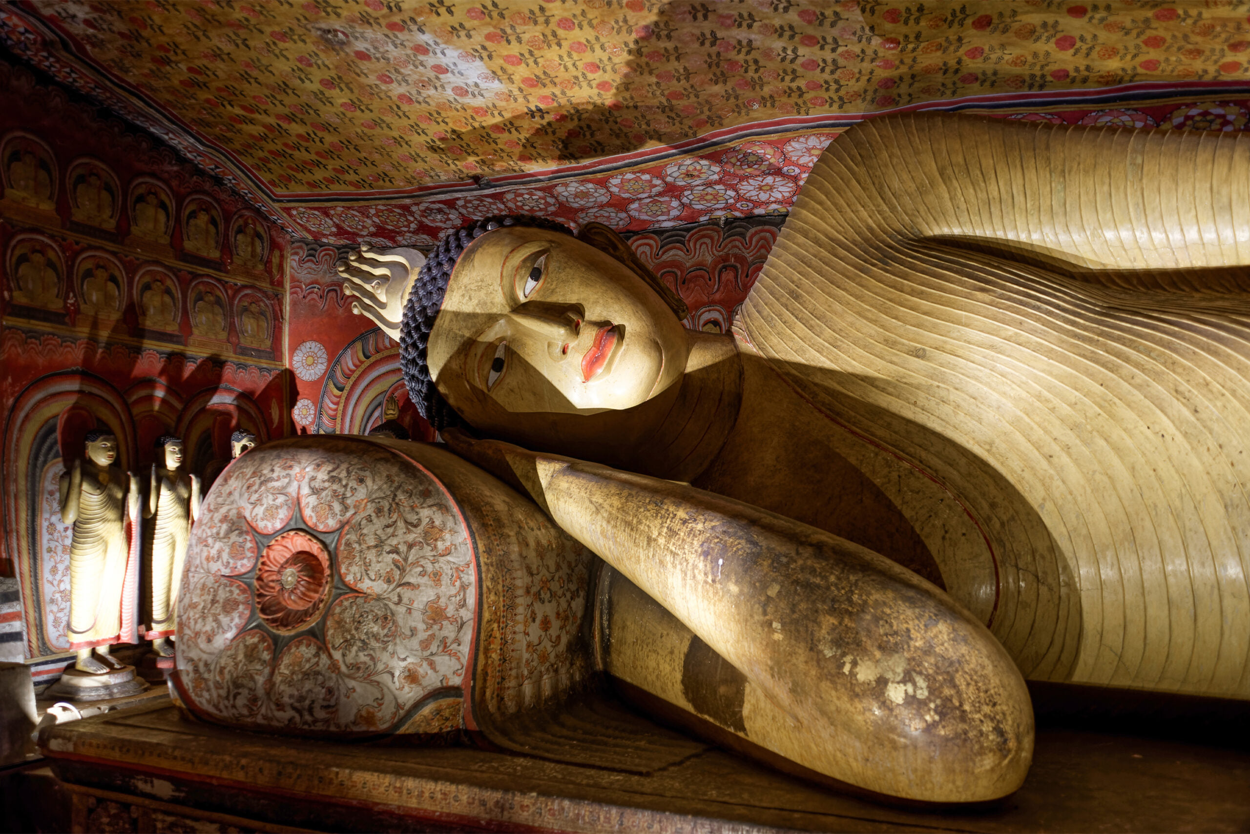 Reclining Buddha (detail), Dambulla Caves; Central Province, Sri Lanka | Photograph: Jakub Hałun (2026) | Wikimedia Commons