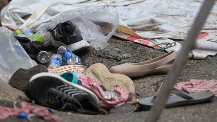 Abandoned footwear and other personal belongings outside the Chorebagan Sarbojanin Durga Puja pandal in Kolkata, where a stampede killed 19 people Saturday night | Suraj Singh Bisht | ThePrint