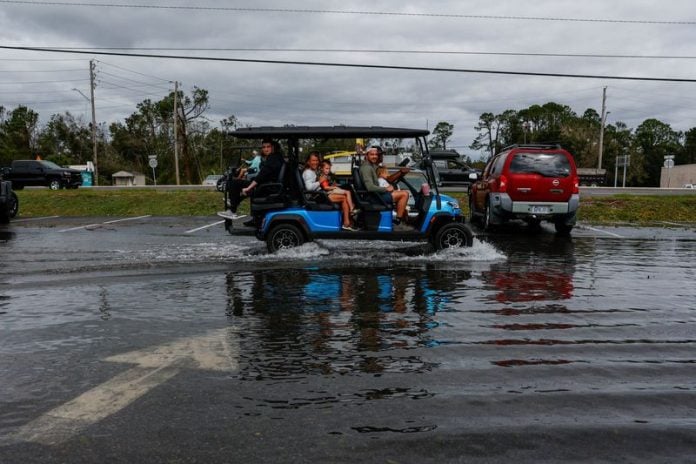Isaias kills four, about 670,000 without power after landfall