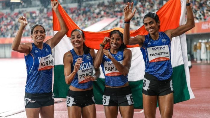 India's relay team athletes (L-R) Kiran Pahal, Prachi Choudhary, Vithya Ramaraj and MR Poovamma Machettira celebrate after winning Gold medal in the Women's 4x400m relay at the 2026 Asian Games in Nagoya, Japan | ANI