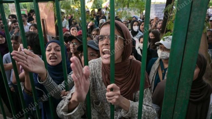 Students protesting inside the Jamia Millia Islamia University in New Delhi | Suraj Singh Bisht, ThePrint