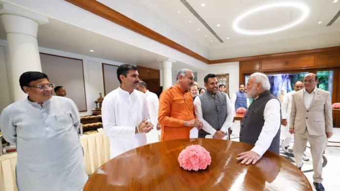 PM Narendra Modi with Haryana BJP MLAs at 7, Lok Kalyan Marg in New Delhi on 3 October, 2026 | X @NayabSainiBJP