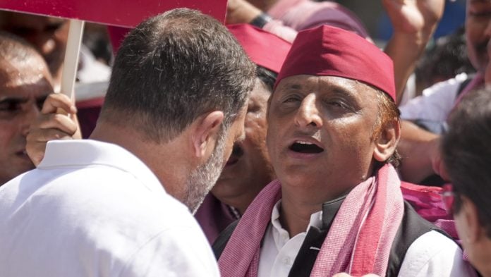 Akhilesh Yadav and Rahul Gandhi caught in conversation during the protest against CEC | Oct. 6, 2026. (PTI Photo/Karma Bhutia)(PTI10_06_2026_000045B)