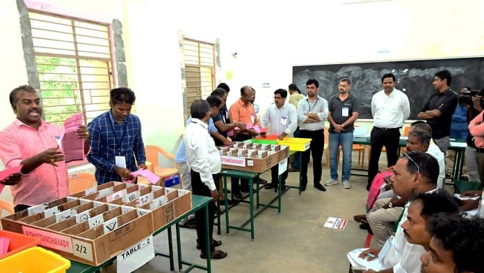 Polling officials at work during the counting of votes for the Thattanchavady Assembly by-election, in Puducherry, Friday, Oct. 9, 2026. (PTI Photo) (PTI10_09_2026_000020B)