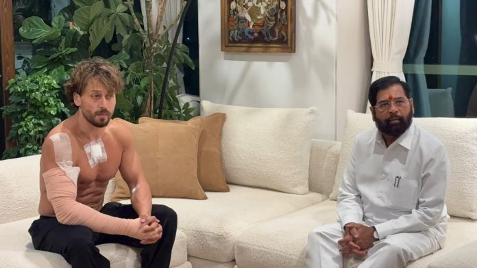 In this image received on Oct. 19, 2026, Maharashtra Deputy Chief Minister Eknath Shinde, right, during a meeting with Bollywood actor Tiger Shroff after unidentified assailants allegedly attacked the actor's vehicle on Oct 18, in Mumbai. | Handout via PTI Photo