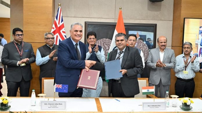 In this image posted on Oct. 19, 2026, Union Minister for Commerce and Industry Piyush Goyal applauds as officials exchange documents during a ceremony marking the upcoming entry into force of the India-New Zealand Free Trade Agreement (FTA), in New Delhi. | @PiyushGoyalOffc/X via PTI Photo