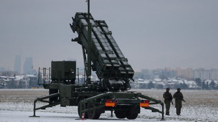 Representational | Servicemen patrolling in front of Patriot air defence system at airport in Warsaw, Poland on 7 February, 2023 | Kacper Pempel/Reuters