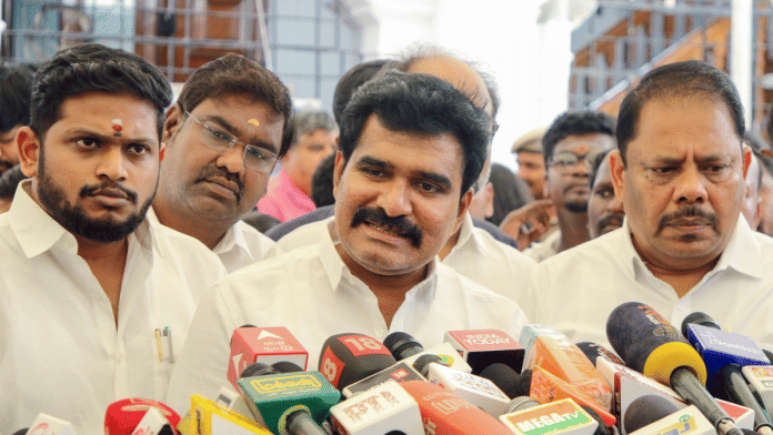 Tamil Nadu Electricity Minister Nirmal Kumar (centre) has been facing barbs of opposition parties for electricity shortfalls in the state | ANI File