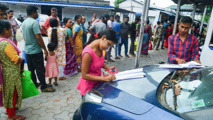 Residents queue up to submit their documents for the Special Intensive Revision (SIR) at a help camp set up by police on the premises of the New Jalpaiguri outpost police station, in Siliguri, West Bengal | ANI File