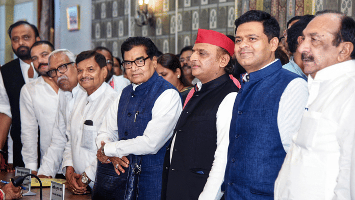 SP president Akhilesh Yadav was present during the filing of nomination by Dhanraj Nathwani (second from right). | ANI