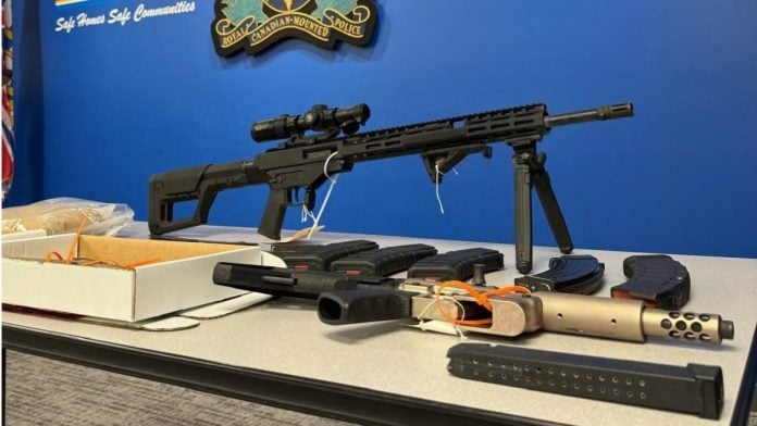 Authorities have seized numerous dangerous items, including four firearms, assorted ammunition and magazines | Facebook/Langley RCMP